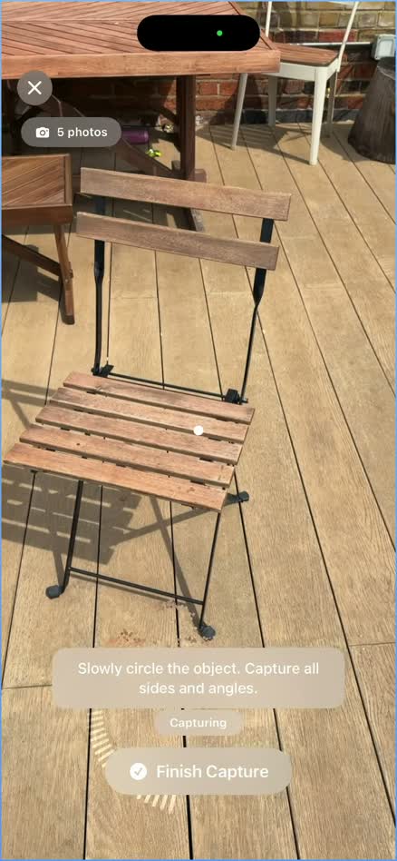 Actual RUUM prototype scanning a wooden outdoor chair